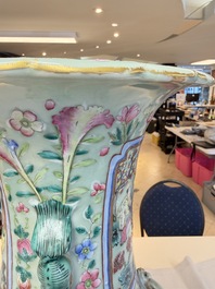 A pair of large Chinese famille rose celadon-ground 'Romance of the Three Kingdoms' vases, 19th C.
