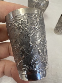 A Chinese Canton or Vietnamese silver bottle vase with landscape design and six cups, 19th C.