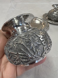 A pair of Chinese silver jarlets, a pair of saucer dishes, a rectangular casket and a cylindrical box, 19/20th C.