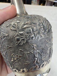 A Chinese Canton or Vietnamese silver bottle vase with landscape design and six cups, 19th C.