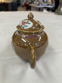 A Chinese famille rose capucine-ground covered teapot with floral design, seven cups and saucers, Yongzheng/Qianlong