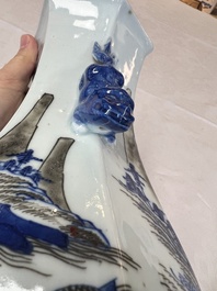 A Chinese blue, white and copper-red 'Hu' vase with figures in a mountainous landscape, 19th C.