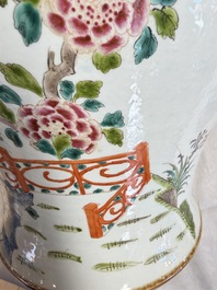 A pair of Chinese famille rose 'Phoenixes among Flowering Branches' vases and covers, 20th C.