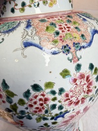 A pair of Chinese famille rose 'Phoenixes among Flowering Branches' vases and covers, 20th C.