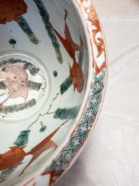 A Chinese famille verte 'Warriors' scroll pot, 19th C.