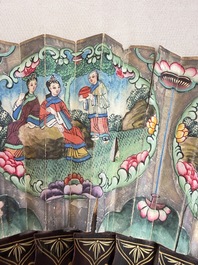 Three Chinese Canton gilt-lacquered and painted paper fans, two with their original box, and an octagonal fan, 19th C.