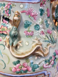 A pair of large Chinese famille rose celadon-ground 'Romance of the Three Kingdoms' vases, 19th C.