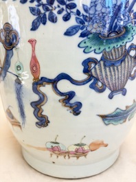 A Chinese doucai and famille rose rouleau vase with figures among antiquities, 19th C.