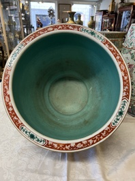 A Chinese famille verte pink-ground scroll pot with narrative design, 19th C.