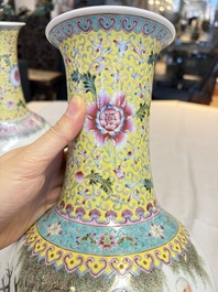 A pair of Chinese famille rose bottle vases, Qianlong mark, 20th C.