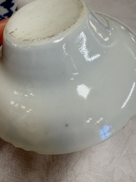 A pair of Chinese inscribed blue and white 'Clouds' tea bowls, covers and stands, Guangxu mark and of the period