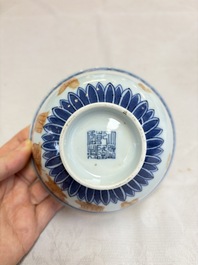 A pair of Chinese blue and white iron-red-decorated 'Three Star Gods' bowls, Qianlong mark and of the period
