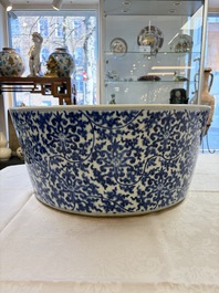 A massive Chinese blue and white 'Buddhist lotus scroll' circular basin, Kangxi