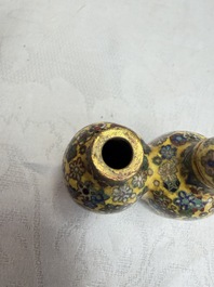 A collection of 12 Chinese cloisonn&eacute; snuff bottles with floral design, 19/20th C.
