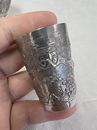 A Chinese Canton or Vietnamese silver bottle vase with landscape design and six cups, 19th C.