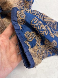 A Chinese embroidered silk blue-ground 'Dragons' robe, adapted into a lady's dress, 19th C. and later