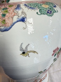 A pair of Chinese famille rose 'Phoenixes among Flowering Branches' vases and covers, 20th C.