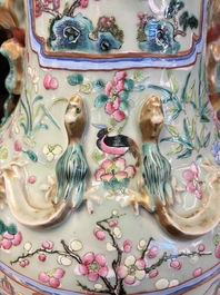 A pair of large Chinese famille rose celadon-ground 'Romance of the Three Kingdoms' vases, 19th C.