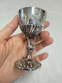 A Chinese silver 'Dragon' vase, two stem cups and a handled cup, various marks, 19/20th C.