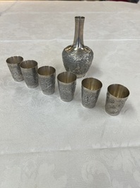 A Chinese Canton or Vietnamese silver bottle vase with landscape design and six cups, 19th C.