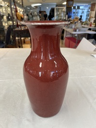 A Chinese monochrome sang-de-boeuf vase, 19th C.