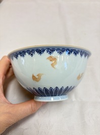 A pair of Chinese blue and white iron-red-decorated 'Three Star Gods' bowls, Qianlong mark and of the period