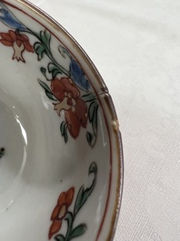 A Chinese famille rose capucine-ground covered teapot with floral design, seven cups and saucers, Yongzheng/Qianlong