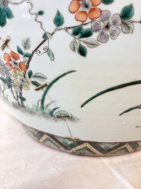 A pair of Chinese famille verte 'Flowers and Butterflies' fishbowls, 19th C.