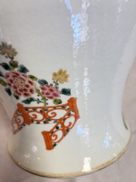 A pair of Chinese famille rose 'Phoenixes among Flowering Branches' vases and covers, 20th C.