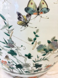 A pair of Chinese famille verte 'Flowers and Butterflies' fishbowls, 19th C.