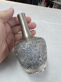 A Chinese Canton or Vietnamese silver bottle vase with landscape design and six cups, 19th C.