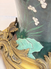 A massive pair of gilt-bronze-mounted famille noire style vases, Samson, Paris, 19th C.