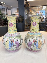 A pair of Chinese famille rose bottle vases, Qianlong mark, 20th C.