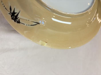 A pair of Chinese famille verte caf&eacute;-au-lait-ground plates with floral design, lotus mark, Kangxi
