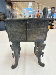 A Chinese archaistic bronze censer with Taotie design, Fang Ding 方鼎, Ming