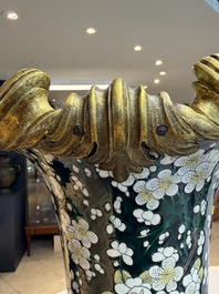 A massive pair of gilt-bronze-mounted famille noire style vases, Samson, Paris, 19th C.