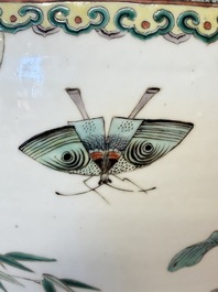A pair of Chinese famille verte 'Flowers and Butterflies' fishbowls, 19th C.