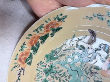 A pair of Chinese famille verte caf&eacute;-au-lait-ground plates with floral design, lotus mark, Kangxi