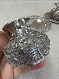 A pair of Chinese silver jarlets, a pair of saucer dishes, a rectangular casket and a cylindrical box, 19/20th C.