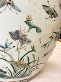A pair of Chinese famille verte 'Flowers and Butterflies' fishbowls, 19th C.