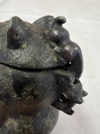 A rare Chinese archaistic bronze bear-form wine vessel, Gong 觥, Han or later