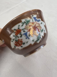A Chinese famille rose capucine-ground covered teapot with floral design, seven cups and saucers, Yongzheng/Qianlong