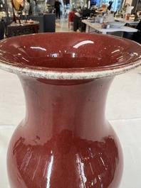 A Chinese monochrome sang-de-boeuf vase, 19th C.