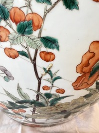 A pair of Chinese famille verte 'Flowers and Butterflies' fishbowls, 19th C.