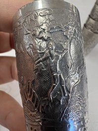 A Chinese Canton or Vietnamese silver bottle vase with landscape design and six cups, 19th C.