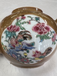 A Chinese famille rose capucine-ground covered teapot with floral design, seven cups and saucers, Yongzheng/Qianlong