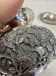 A pair of Chinese silver jarlets, a pair of saucer dishes, a rectangular casket and a cylindrical box, 19/20th C.