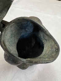 A rare Chinese archaistic bronze bear-form wine vessel, Gong 觥, Han or later