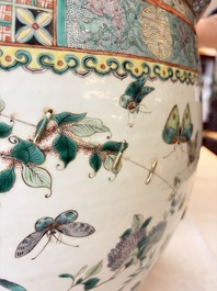 A pair of Chinese famille verte 'Flowers and Butterflies' fishbowls, 19th C.