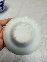 A pair of Chinese inscribed blue and white 'Clouds' tea bowls, covers and stands, Guangxu mark and of the period